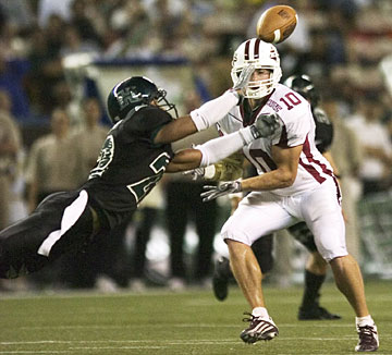 Ashley Lelie of the Atlanta Falcons holds the ball before the game